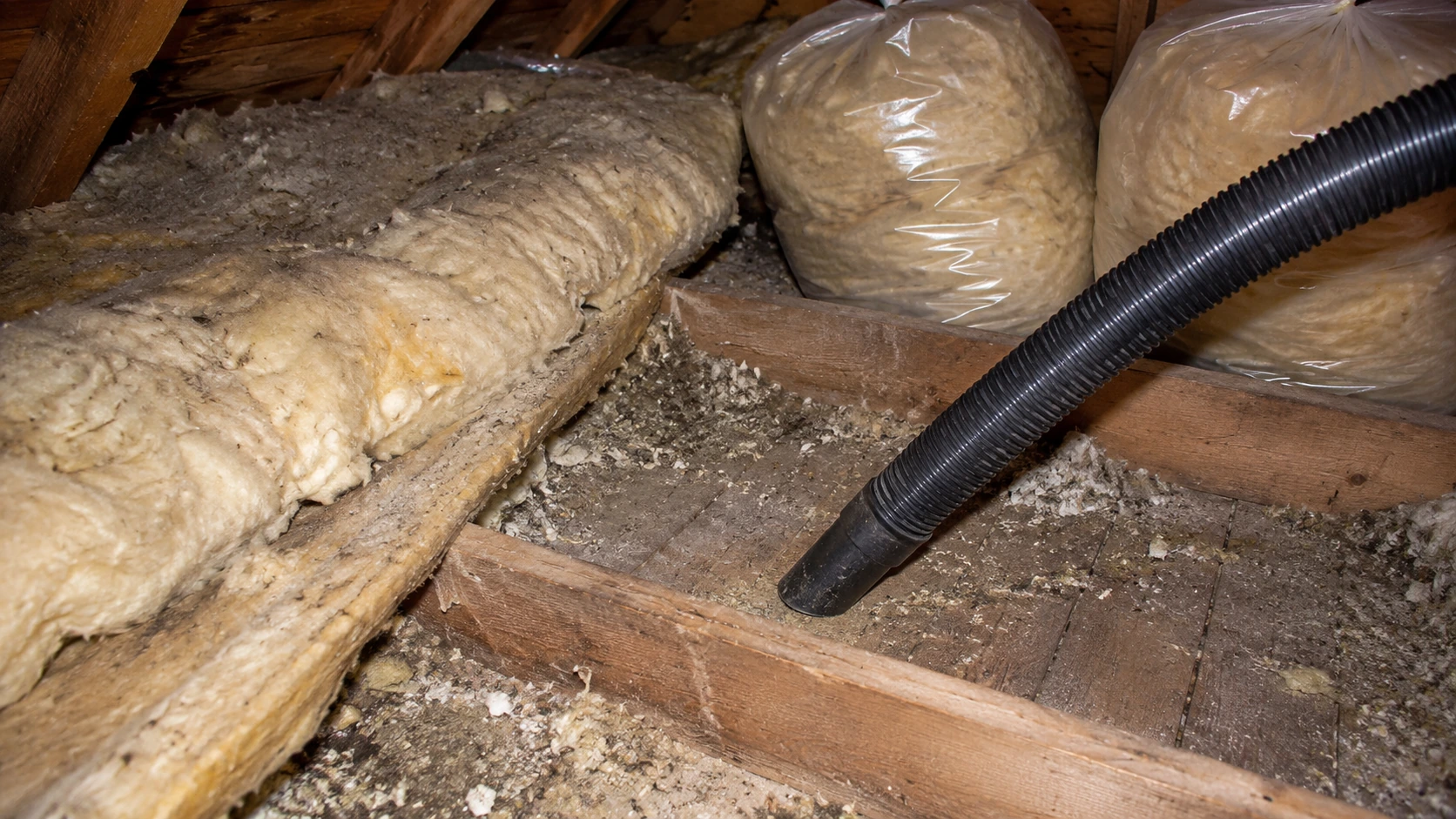 Vacuum Old Insulation and Dust Before Installing New Material